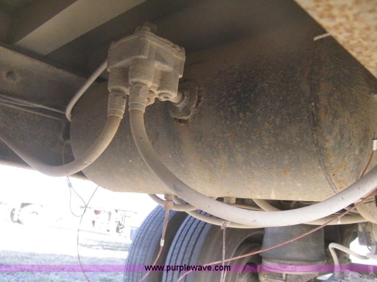 image for item B8489 1991 Travis spread axle end dump trailer