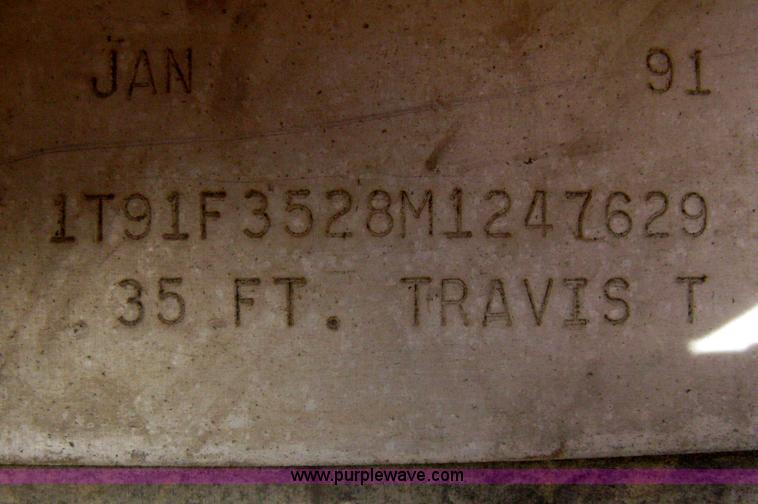 image for item B8489 1991 Travis spread axle end dump trailer