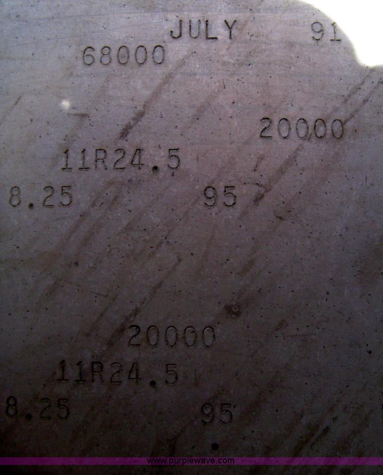 image for item B8489 1991 Travis spread axle end dump trailer