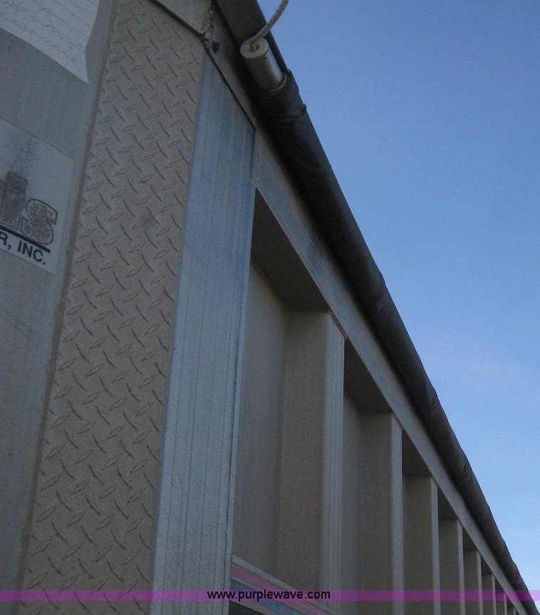 image for item B8489 1991 Travis spread axle end dump trailer