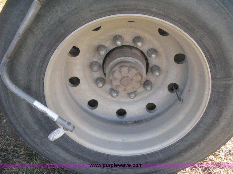 image for item B8489 1991 Travis spread axle end dump trailer