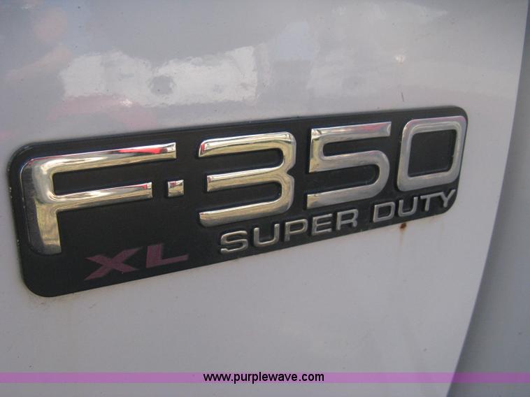 image for item B8493 2002 Ford F350  XL Super Duty Crew Cab utility truck