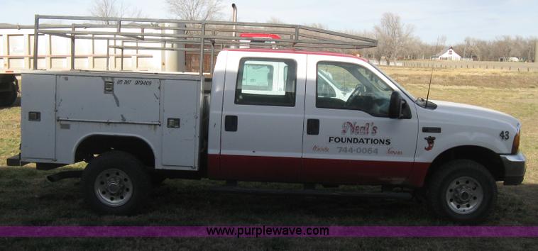 image for item B8496 1999 Ford F250 XLT Super Duty Crew Cab utility truck