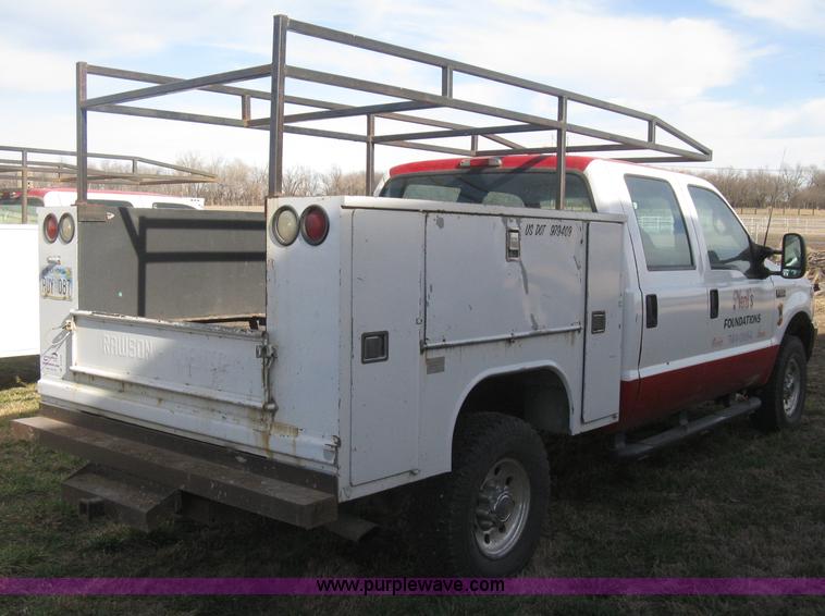 image for item B8496 1999 Ford F250 XLT Super Duty Crew Cab utility truck