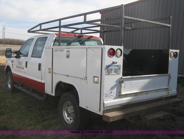 image for item B8496 1999 Ford F250 XLT Super Duty Crew Cab utility truck