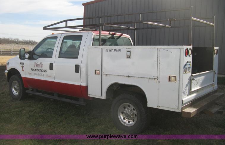 image for item B8496 1999 Ford F250 XLT Super Duty Crew Cab utility truck