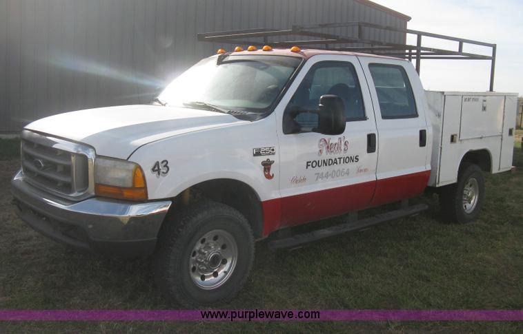 image for item B8496 1999 Ford F250 XLT Super Duty Crew Cab utility truck