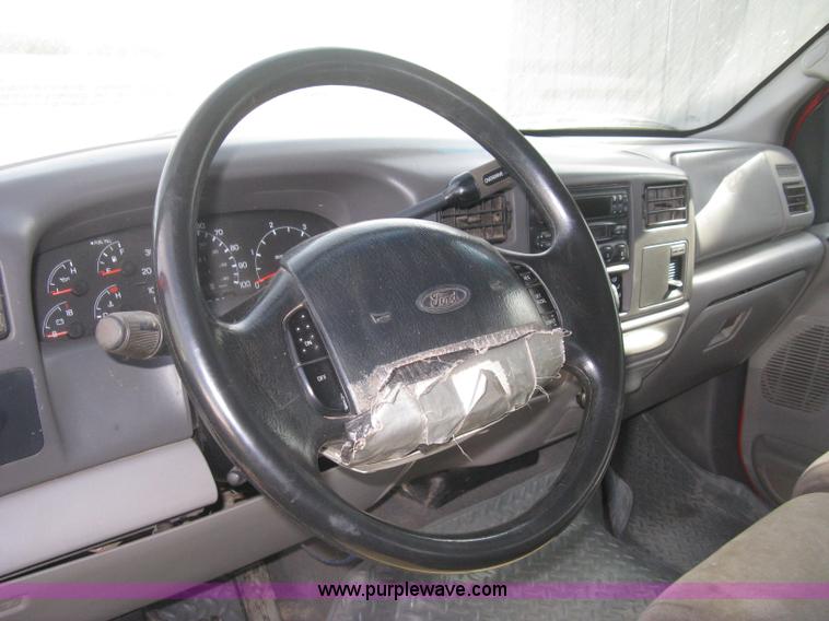 image for item B8496 1999 Ford F250 XLT Super Duty Crew Cab utility truck