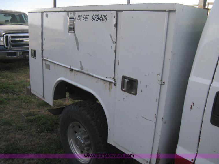 image for item B8496 1999 Ford F250 XLT Super Duty Crew Cab utility truck