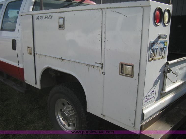 image for item B8496 1999 Ford F250 XLT Super Duty Crew Cab utility truck