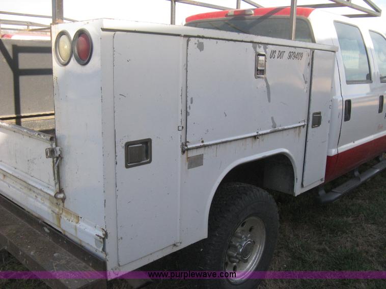 image for item B8496 1999 Ford F250 XLT Super Duty Crew Cab utility truck