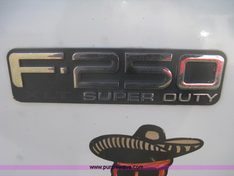 image for item B8496 1999 Ford F250 XLT Super Duty Crew Cab utility truck