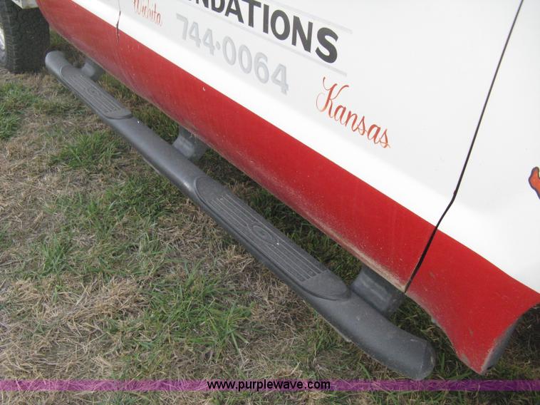 image for item B8496 1999 Ford F250 XLT Super Duty Crew Cab utility truck