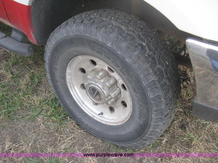 image for item B8496 1999 Ford F250 XLT Super Duty Crew Cab utility truck