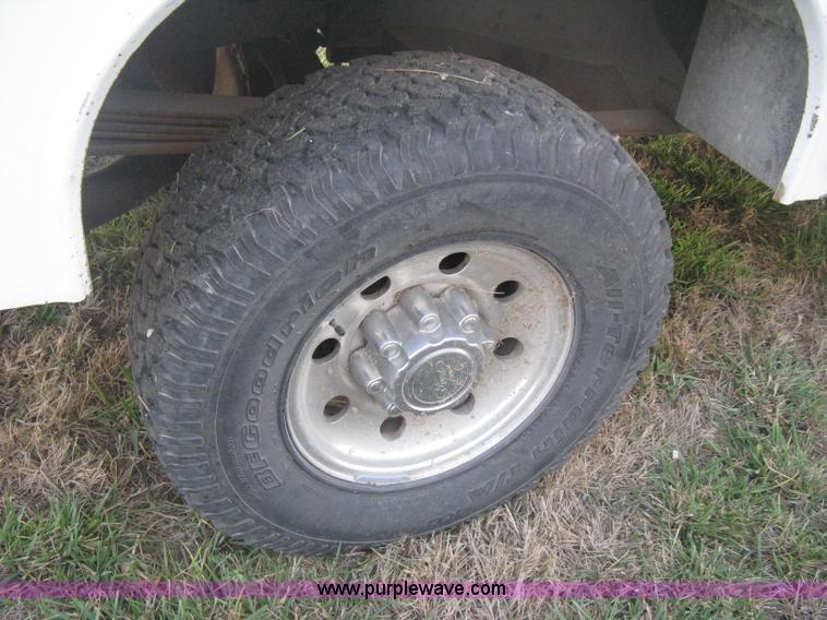 image for item B8496 1999 Ford F250 XLT Super Duty Crew Cab utility truck