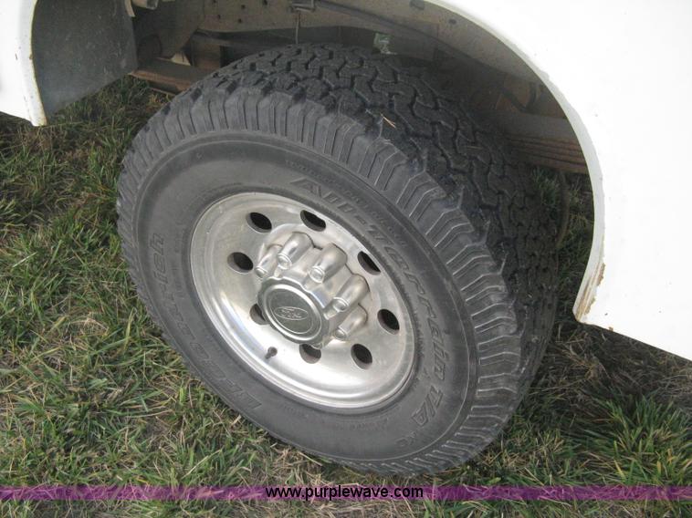 image for item B8496 1999 Ford F250 XLT Super Duty Crew Cab utility truck