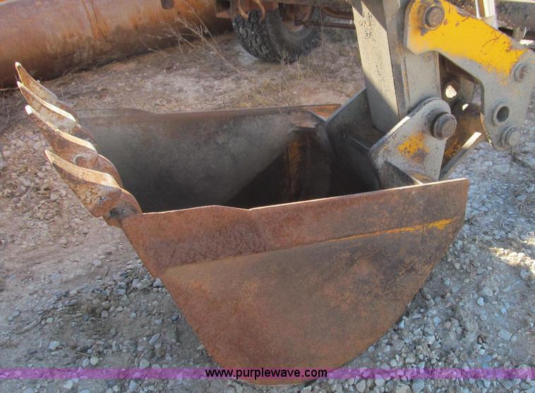 image for item E3670 1997 JCB 214 Series II backhoe