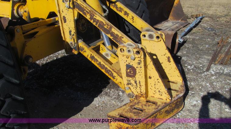 image for item E3672 1992 John Deere 670B motor grader