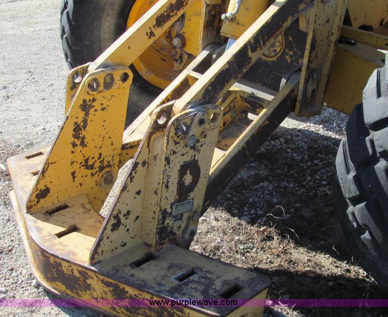 image for item E3672 1992 John Deere 670B motor grader