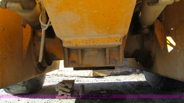 image for item E3672 1992 John Deere 670B motor grader