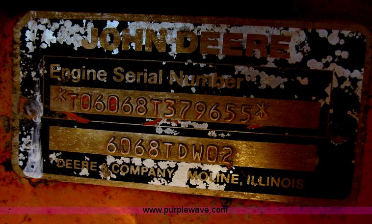 image for item E3672 1992 John Deere 670B motor grader