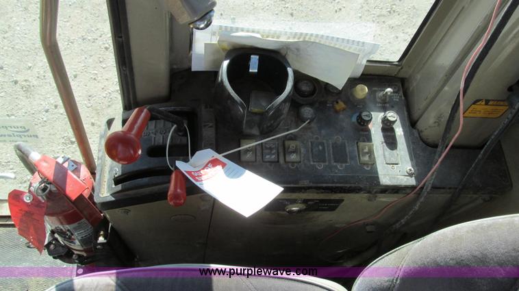 image for item E3672 1992 John Deere 670B motor grader