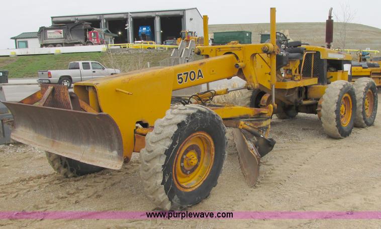 image for item E7036 John Deere 570A articulated motor grader