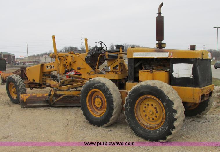 image for item E7036 John Deere 570A articulated motor grader
