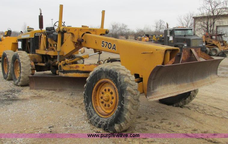 image for item E7036 John Deere 570A articulated motor grader