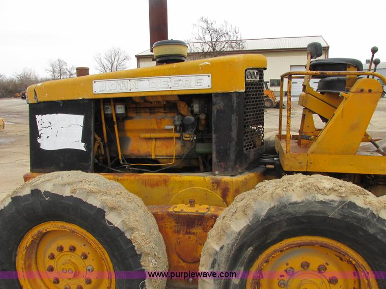 image for item E7036 John Deere 570A articulated motor grader