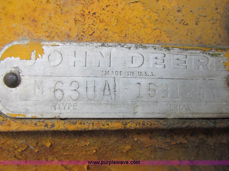 image for item E7036 John Deere 570A articulated motor grader