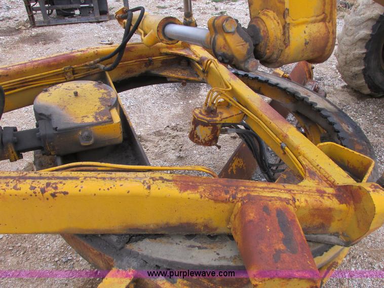 image for item E7036 John Deere 570A articulated motor grader