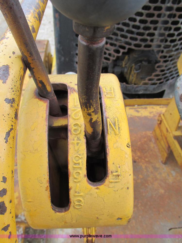 image for item E7036 John Deere 570A articulated motor grader