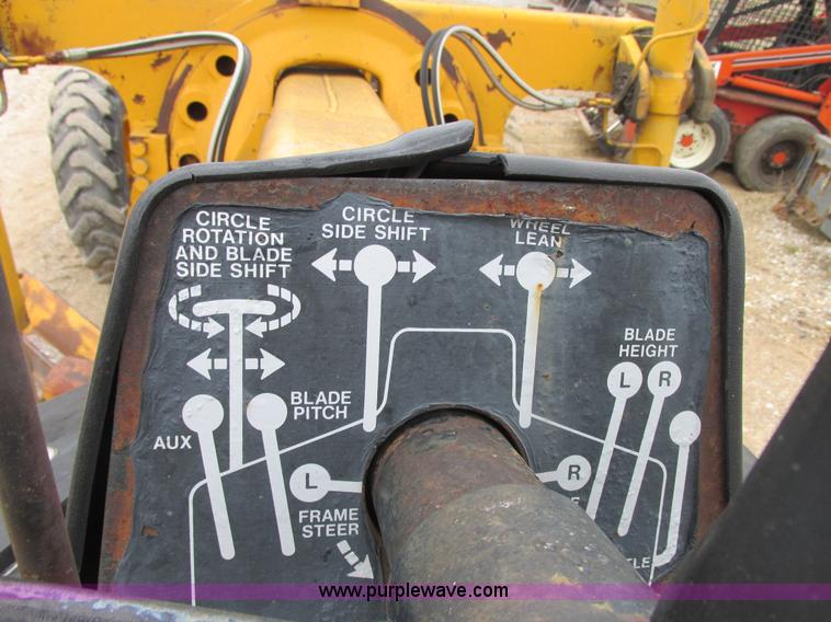 image for item E7036 John Deere 570A articulated motor grader