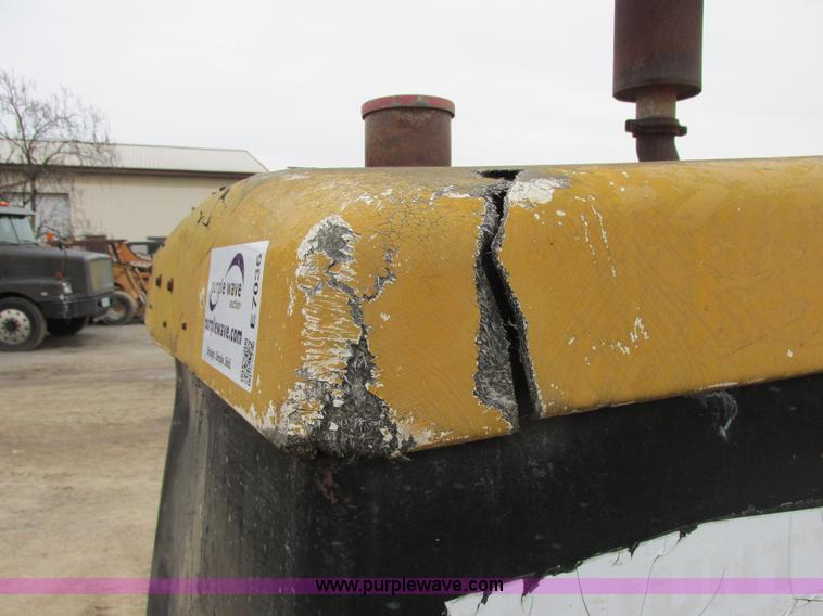 image for item E7036 John Deere 570A articulated motor grader