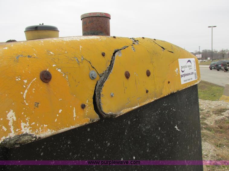 image for item E7036 John Deere 570A articulated motor grader