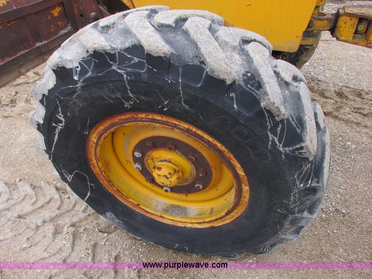 image for item E7036 John Deere 570A articulated motor grader