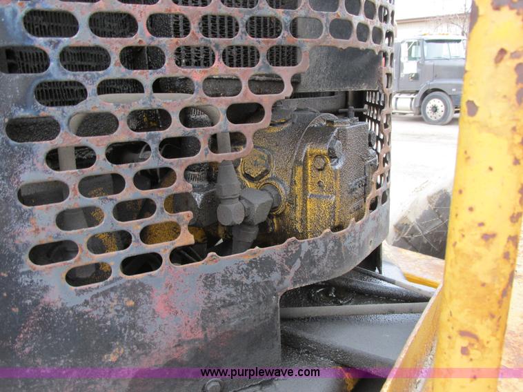 image for item E7036 John Deere 570A articulated motor grader