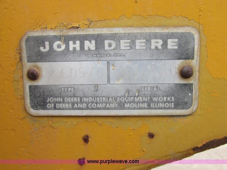 image for item E7036 John Deere 570A articulated motor grader