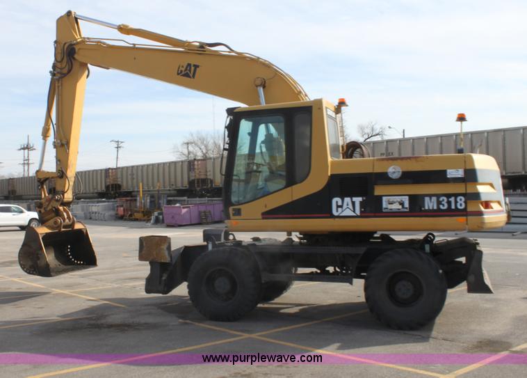image for item E8349 1998 Caterpillar M318 mobile excavator
