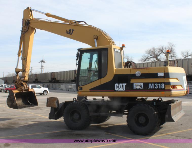 image for item E8349 1998 Caterpillar M318 mobile excavator