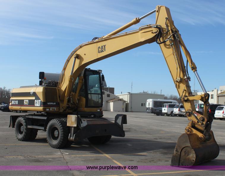 image for item E8349 1998 Caterpillar M318 mobile excavator
