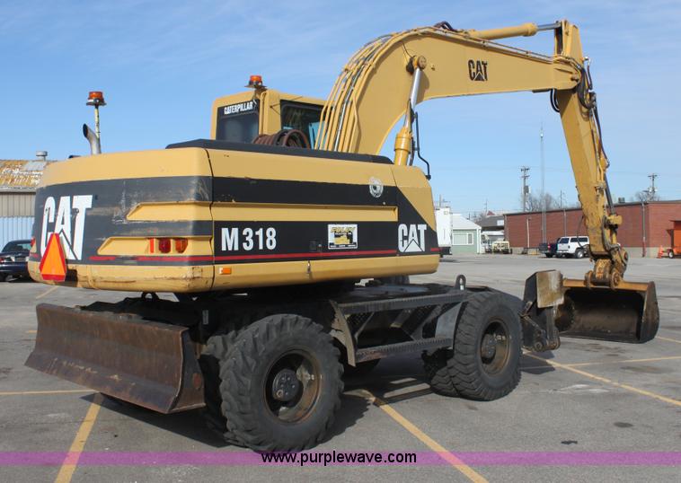 image for item E8349 1998 Caterpillar M318 mobile excavator