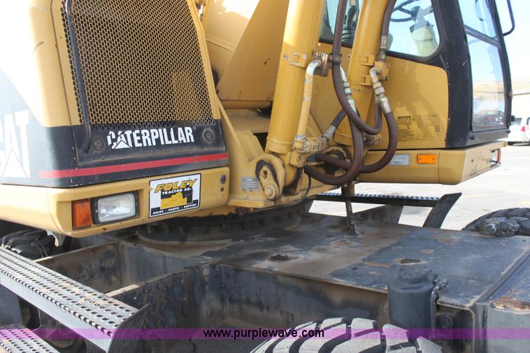 image for item E8349 1998 Caterpillar M318 mobile excavator