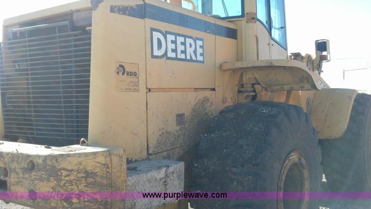 image for item E8351 1999 John Deere 744H wheel loader