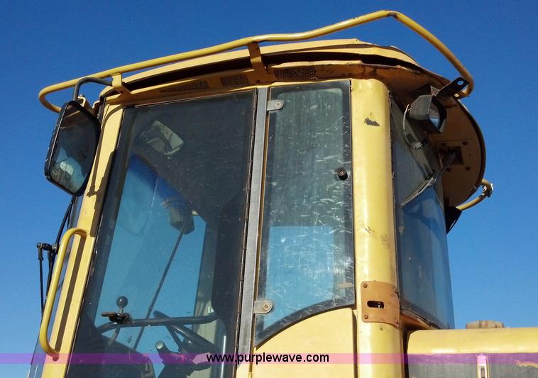 image for item E8351 1999 John Deere 744H wheel loader