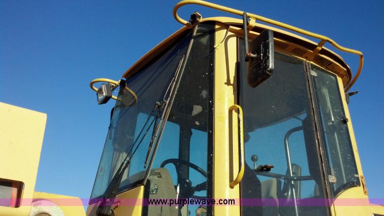 image for item E8351 1999 John Deere 744H wheel loader