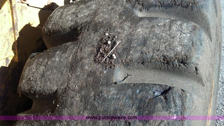 image for item E8351 1999 John Deere 744H wheel loader