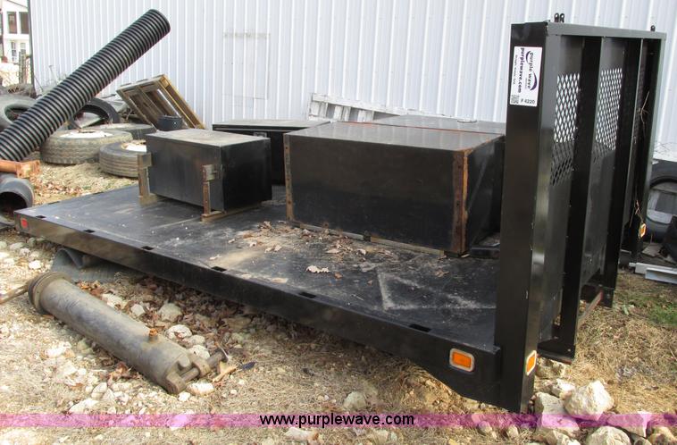 image for item F4220 12.5' flatbed with dump hoist