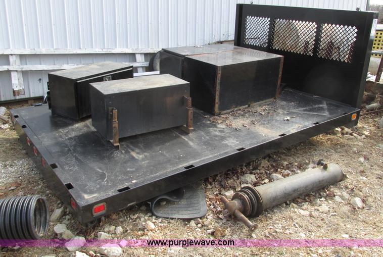 image for item F4220 12.5' flatbed with dump hoist